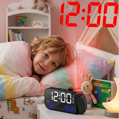 enfant avec radio reveil projecteur double alarme houclock
