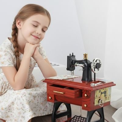 enfant ecoute mélodiesmagiques de boite a musique