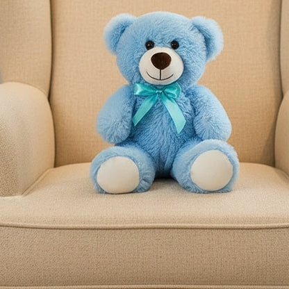 ours en peluche bleu coeur love muebear sur canape