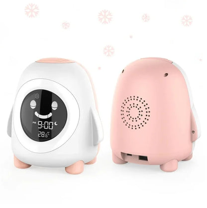 reveil educatif enfant pingouin avec lumière TimiClock rose clair 