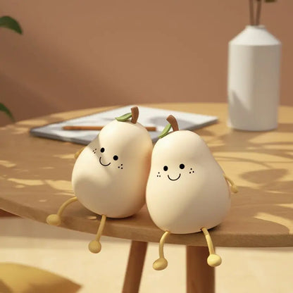 veilleuse enfant poire sur la table